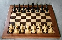 260px-Chess_board_opening_staunton.webp