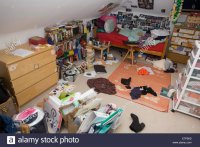 a-teenagers-messy-bedroom-with-clothes-books-and-possessions-abandoned-E7P5K9.jpg