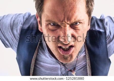 stock-photo-a-very-angry-man-is-looking-straight-in-the-camera-picture-is-made-in-a-high-contrast-effekt-125281880.jpg