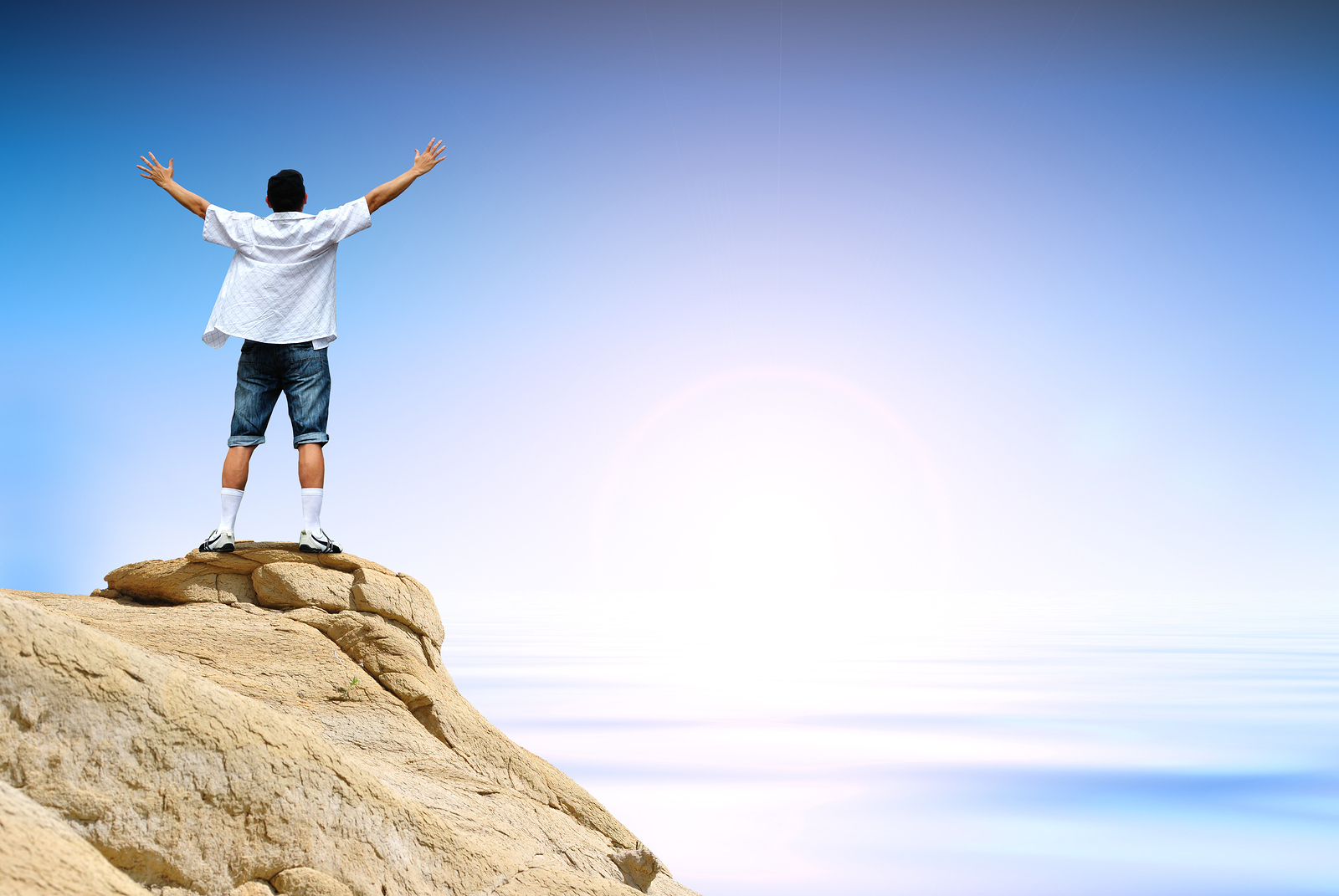 man-on-mountain-top.jpg