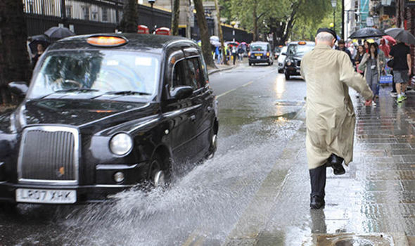 Pedestrian-splashed-driver-puddle-809714.jpg